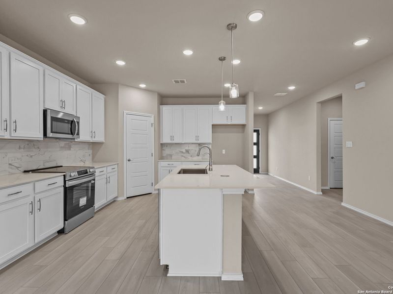 Furnished interior view inside a new home in Royal Crest, San Antonio (Image 4).