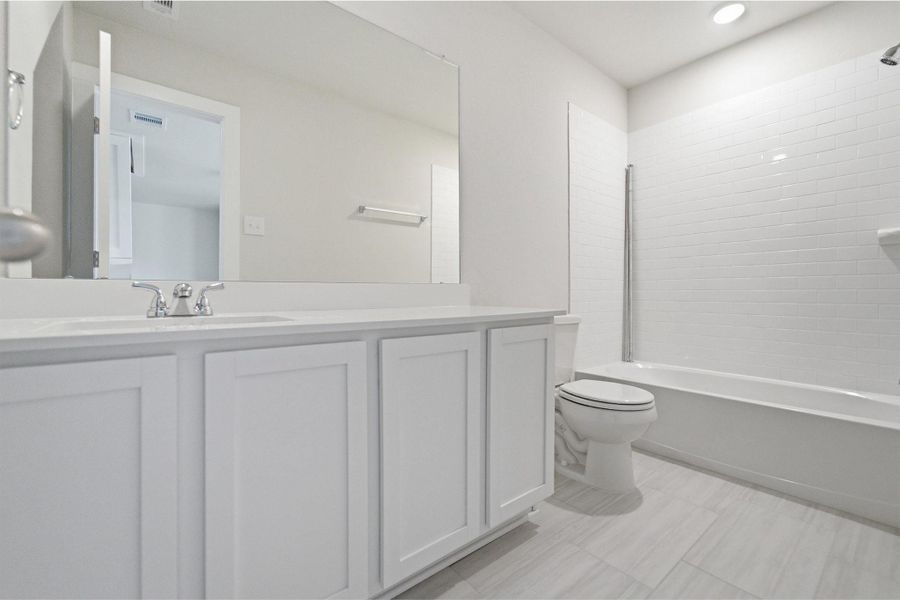 Furnished interior view inside a new home in Caney Mills, Conroe (Image 3).