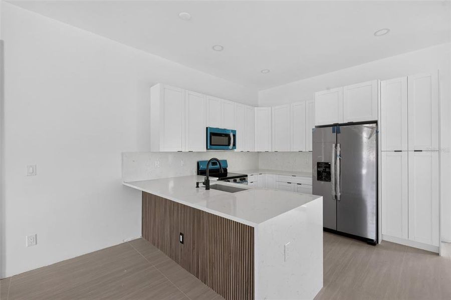 Furnished interior view inside a new home in , Port Charlotte (Image 6).