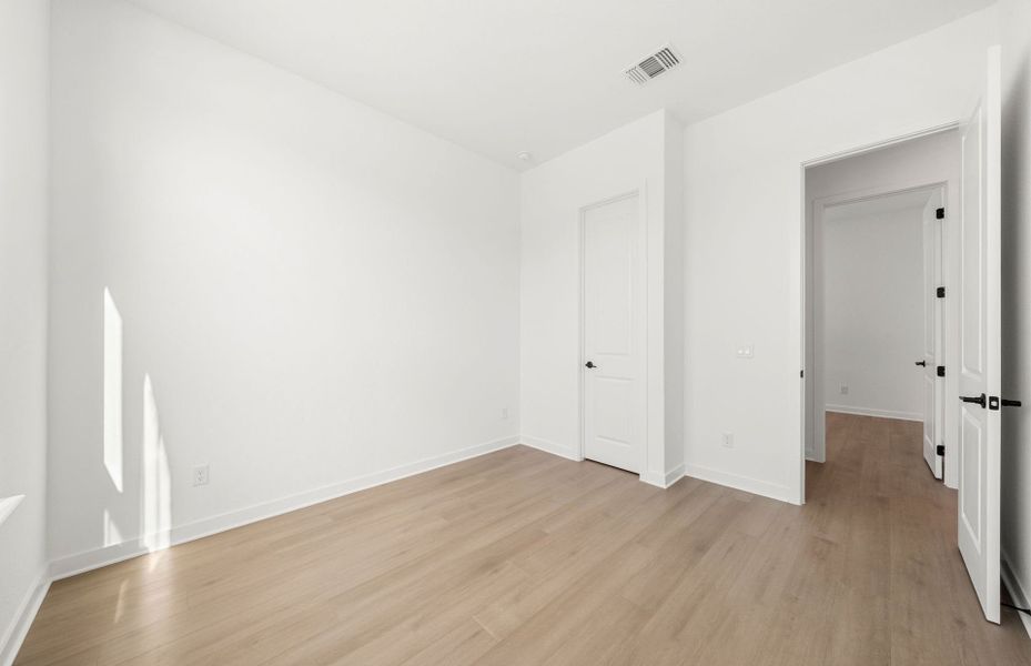 Representative unfurnished interior of a home built from the Dobbin by Pulte Homes in 6 Creeks, Kyle (Image 53).