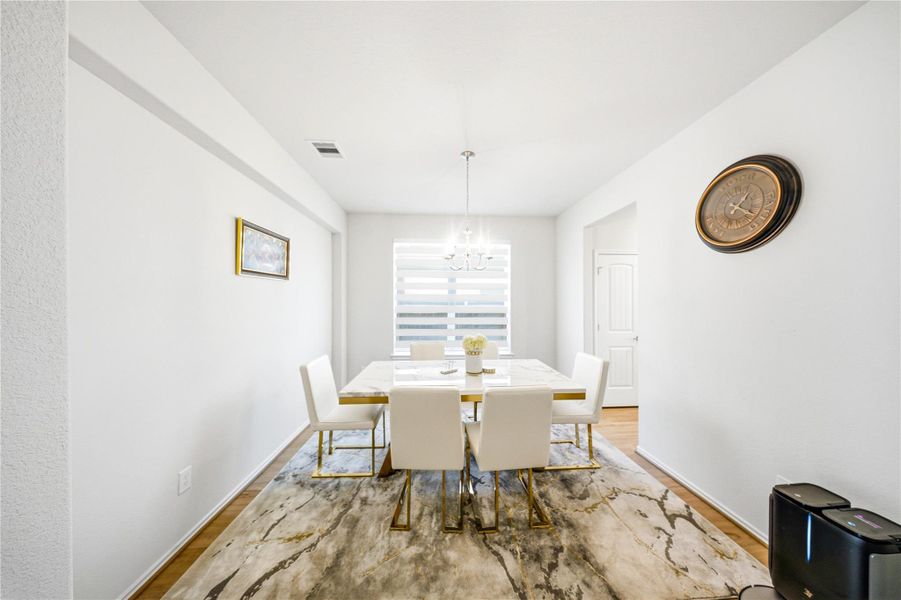 Furnished interior view inside a new home in Sierra Vista, Iowa Colony (Image 11).