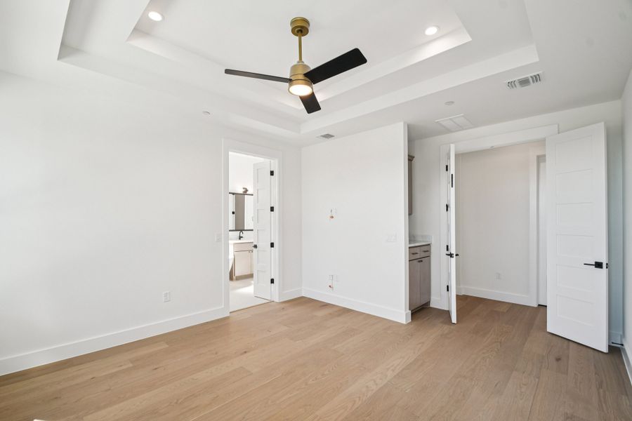 Spacious, unfurnished interior of a new home in Milky Way at River Place, Austin (Image 21).