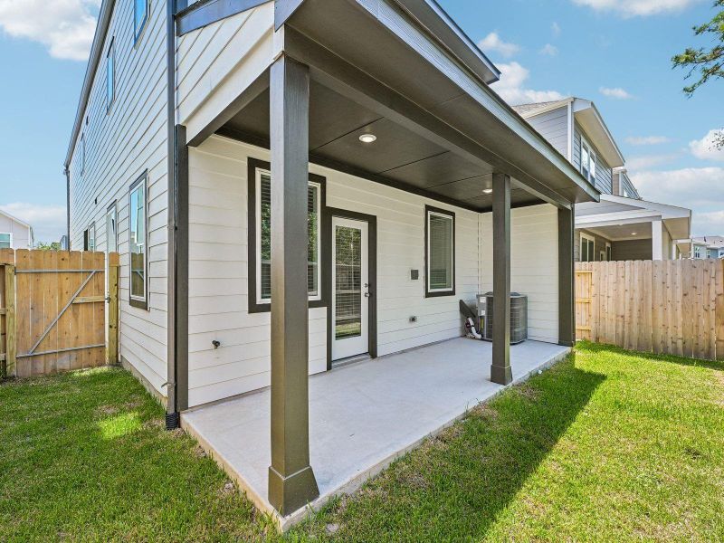 Exterior details and patio area of a home in Pinewood Trails - City Series, Atascocita (Image 27).