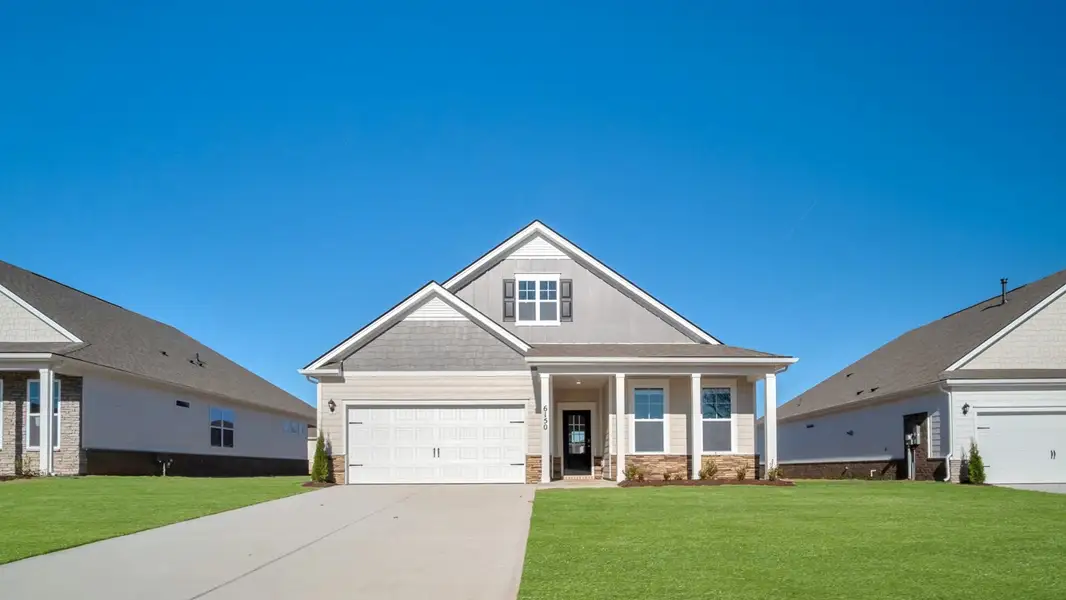 Front exterior of a new home in Legacy Farms, White House, TN, highlighting curb appeal (Image 1). Front exterior of a new home in Legacy Farms, White House, TN, highlighting curb appeal (Image 1).