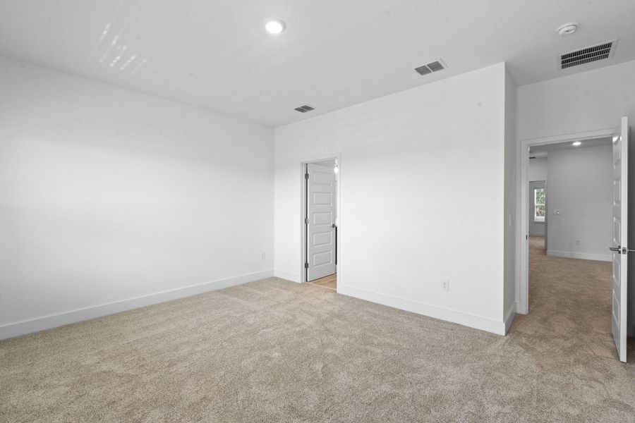 Representative unfurnished interior of a home built from the Edison by Rockwell Homes in Harvest at Ovation - Townhomes, Winter Garden (Image 90). Representative unfurnished interior of a home built from the Edison by Rockwell Homes in Harvest at Ovation - Townhomes, Winter Garden (Image 90).