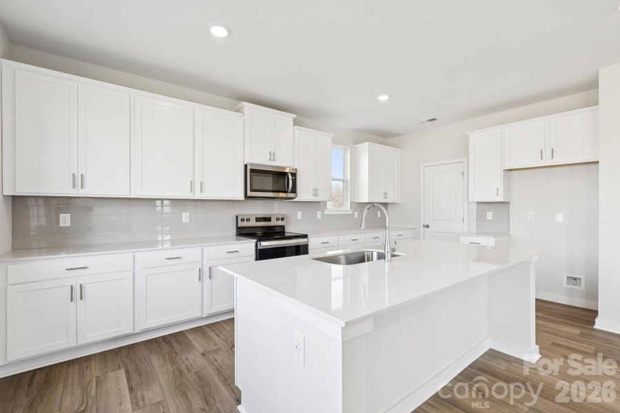 Furnished interior view inside a new home in Running Creek, Locust (Image 6).