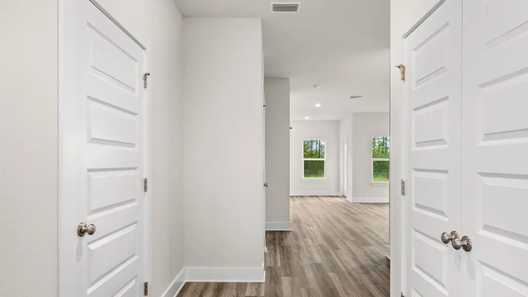 Representative unfurnished interior of a home built from the The Monroe by D.R. Horton in WindMark Beach, Port Saint Joe (Image 17).