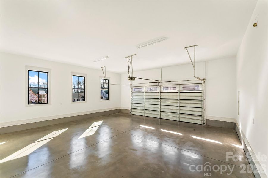 An oversized two car garage with sealed floor.