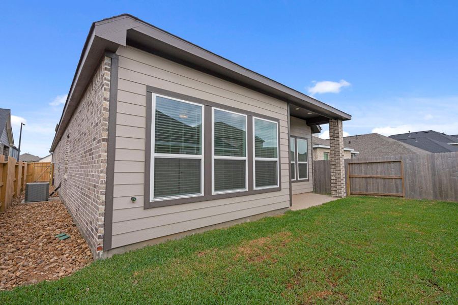 Exterior details and patio area of a home in Emory Glen, Magnolia (Image 4).