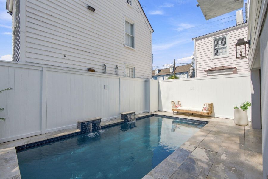Exterior details and patio area of a home in , Charleston (Image 34).