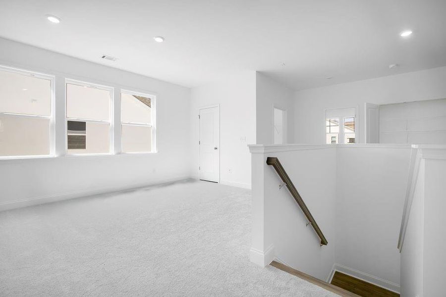 Spacious, unfurnished interior of a new home in Bailey Fence, Dacula (Image 36).