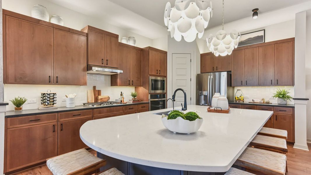 Representative furnished interior of a home built from the Peyton by Chesmar Homes in The Grove at Blackhawk, Pflugerville (Image 25).