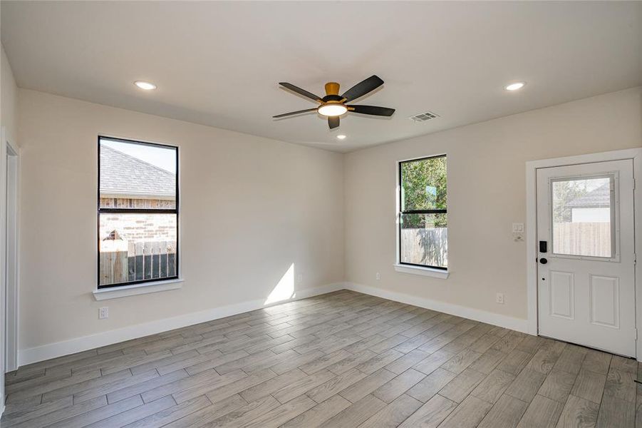 Primary bedroom with access to backyard