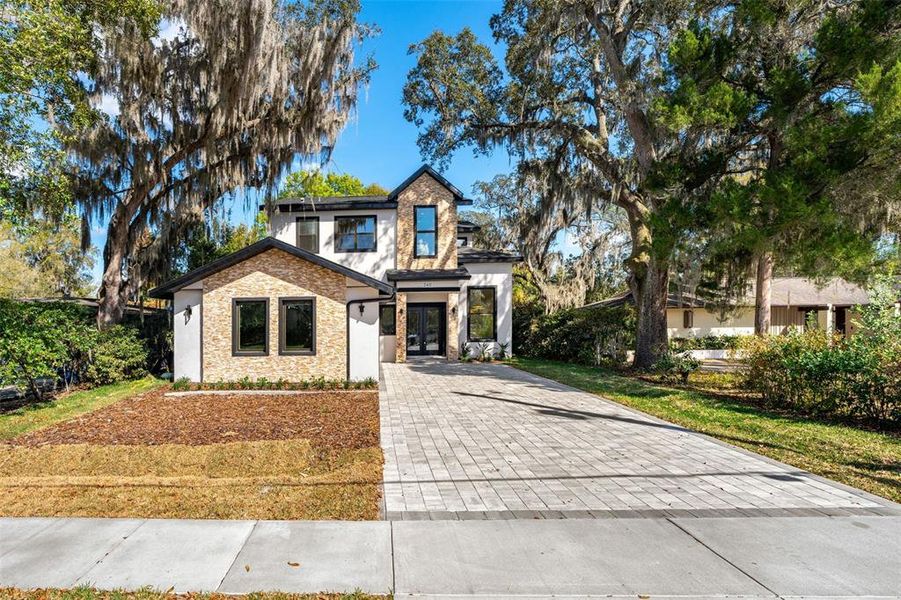 Front exterior of a new home in , Winter Park, FL, highlighting curb appeal (Image 28).