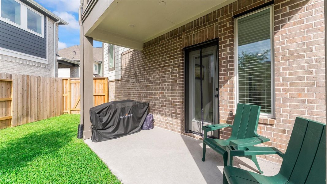 Exterior details and patio area of a home in Balmoral, Humble (Image 27).