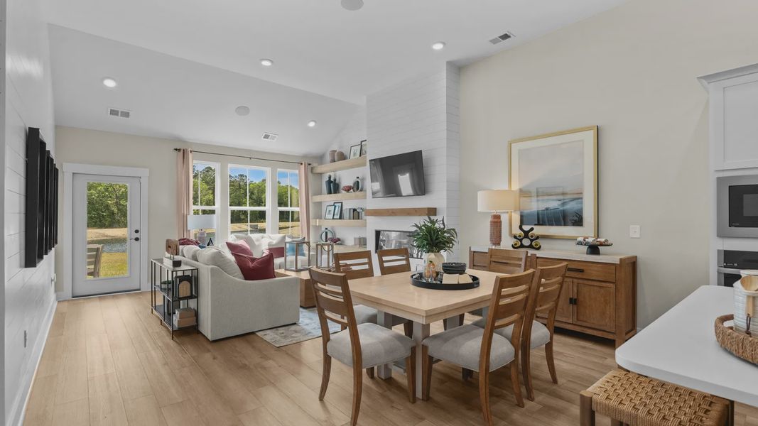 The Summit living room offers open-concept comfort and natural light throughout.