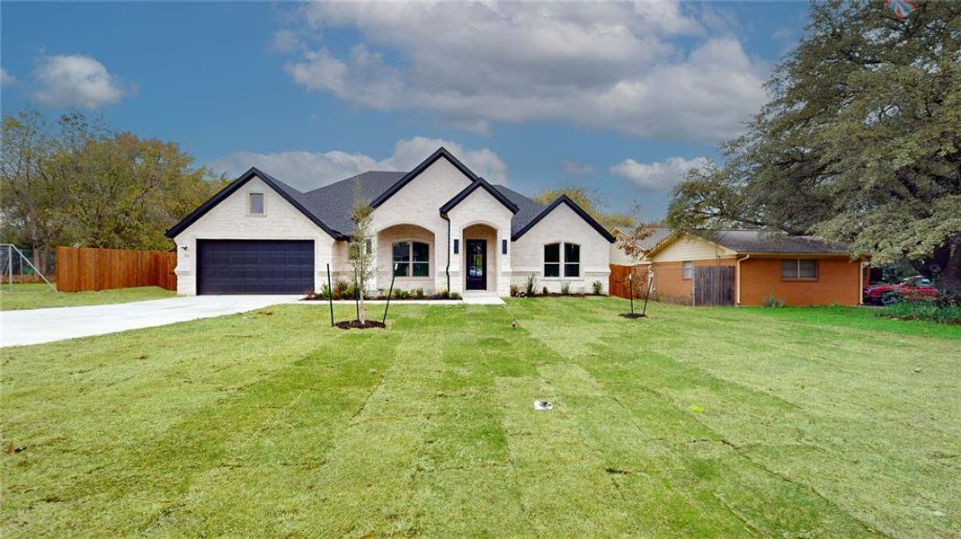 Front exterior of a new home in , Denton, TX, highlighting curb appeal (Image 1).