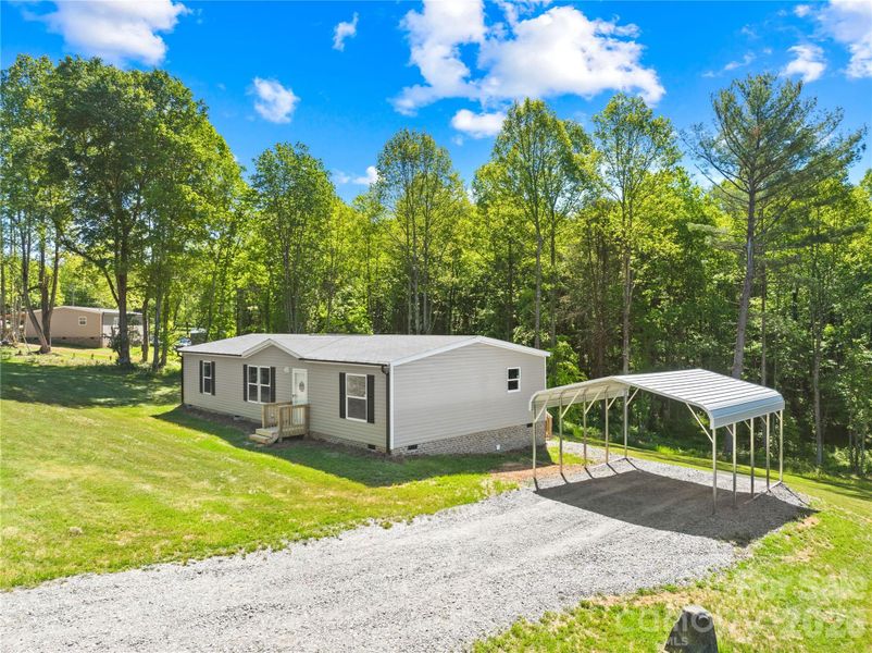Exterior details and patio area of a home in , Thurmond (Image 18).