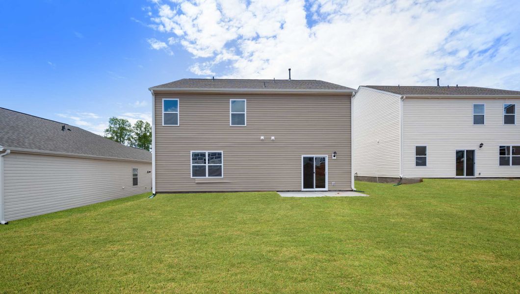 Exterior details and patio area of a home in Hunters Ridge, Woodruff (Image 3).
