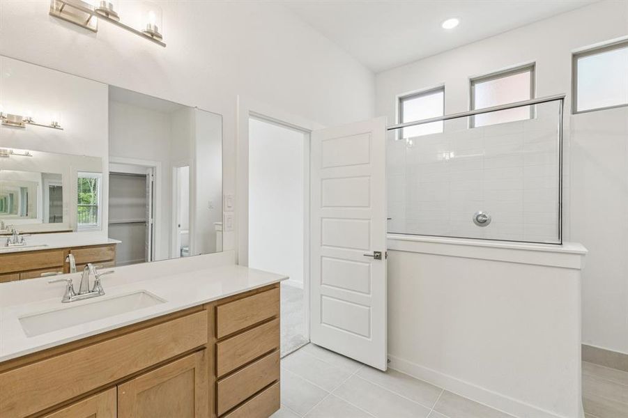 Primary Bathroom in the Da Vinci II home plan by Trophy Signature Homes – REPRESENTATIVE PHOTO