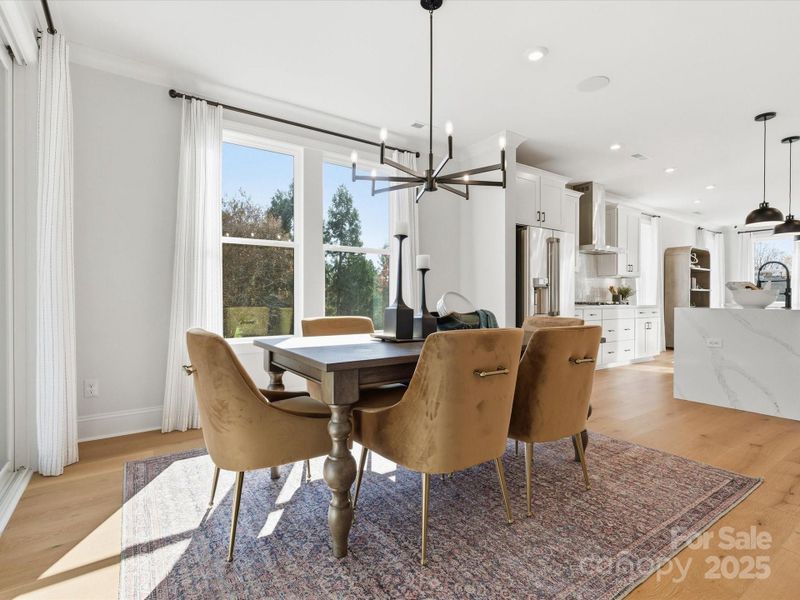 Cozy Dining Space Conveniently Off Kitchen. *Model Photos | Actual Finishes, Structural Selections, and Orientation May Vary. Cozy Dining Space Conveniently Off Kitchen. *Model Photos | Actual Finishes, Structural Selections, and Orientation May Vary.