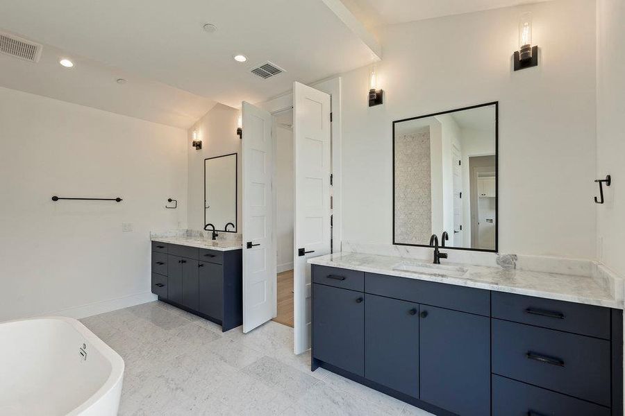Furnished interior view inside a new home in Milky Way at River Place, Austin (Image 29).