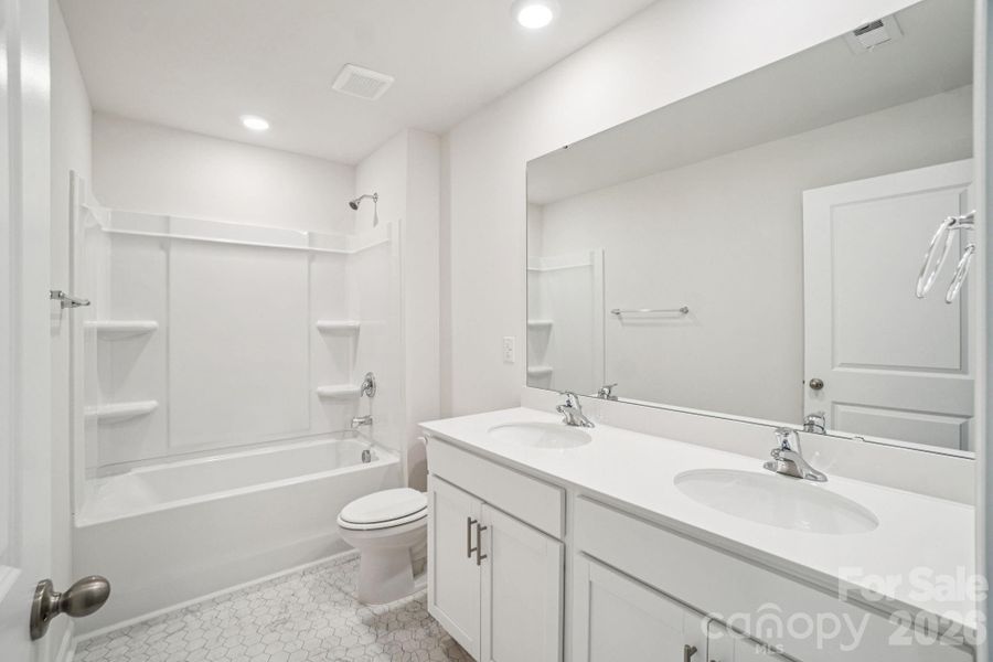 Furnished interior view inside a new home in Rydele Heights, Asheville (Image 7).