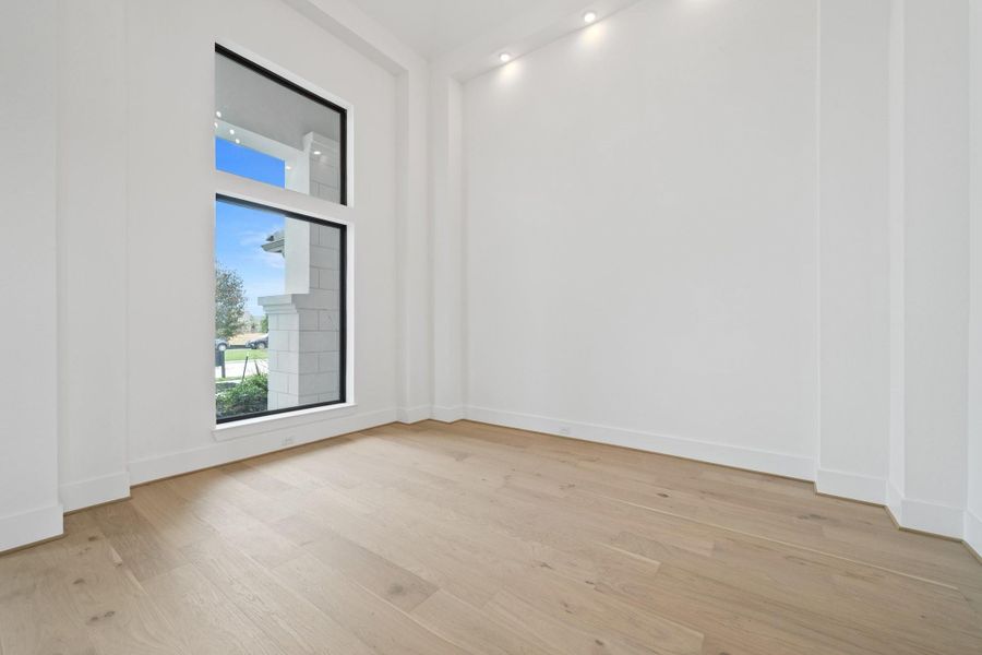 Elegant Formal Dining Room off of the Grand Foyer that's spacious for entertaining & family gatherings with large picture frame windows to let lots of light in. Elegant Formal Dining Room off of the Grand Foyer that's spacious for entertaining & family gatherings with large picture frame windows to let lots of light in.
