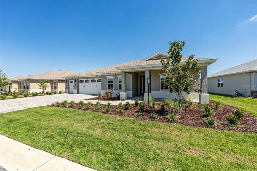 Front exterior of a new home in , Ocala, FL, highlighting curb appeal (Image 20).