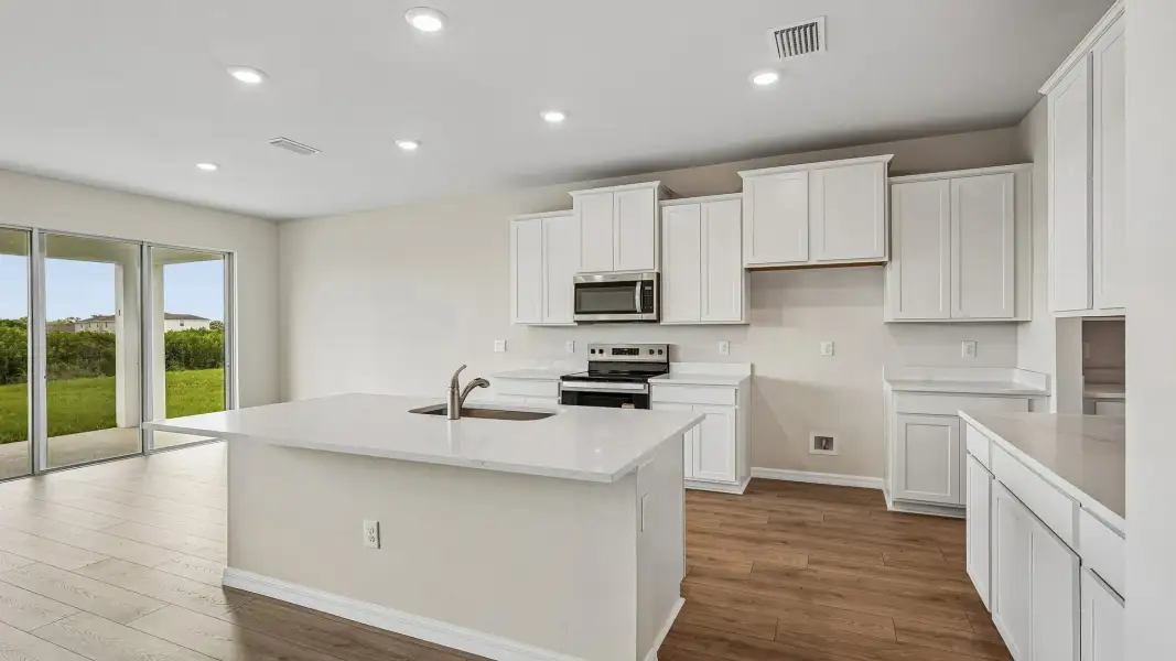 Furnished interior view inside a new home in Seaire, Parrish (Image 5).