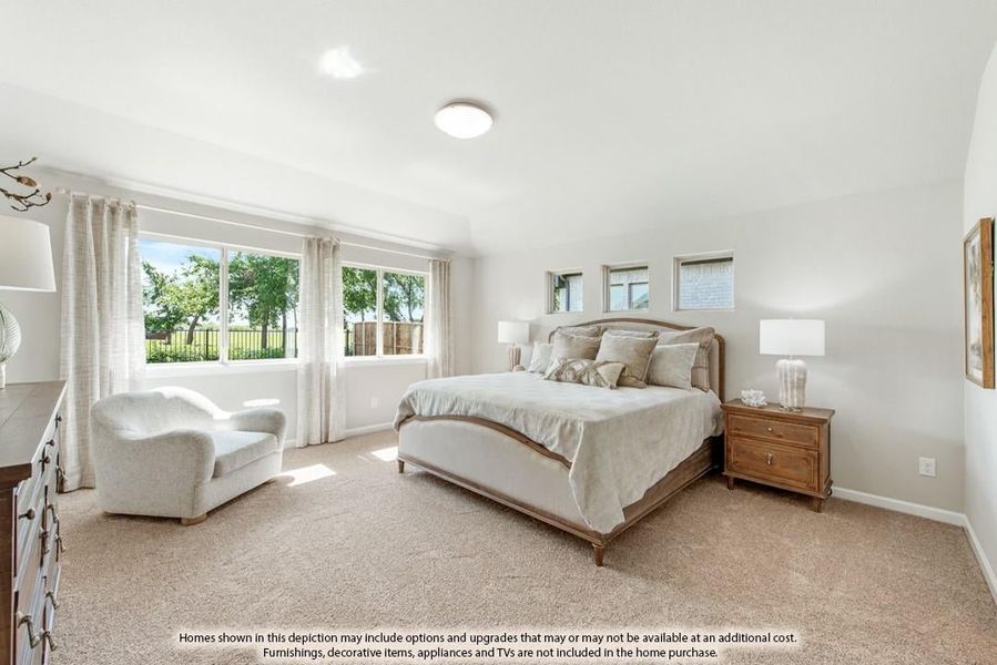 Spacious master bedroom with wood-framed bed, carpet flooring, and large windows with natural light