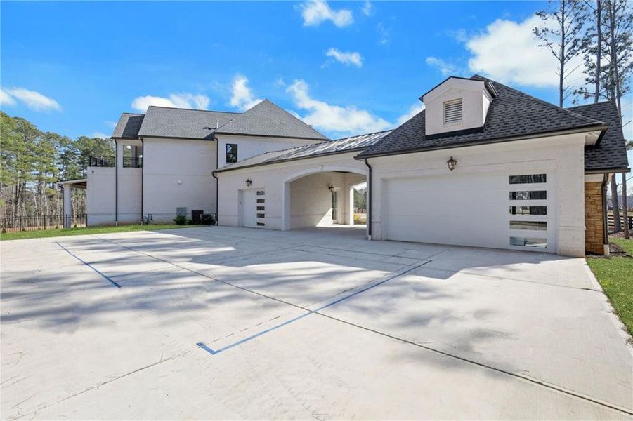 Front exterior of a new home in , Milton, GA, highlighting curb appeal (Image 31).