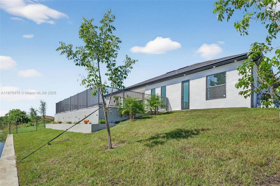 Front exterior of a new home in , Cape Coral, FL, highlighting curb appeal (Image 23).