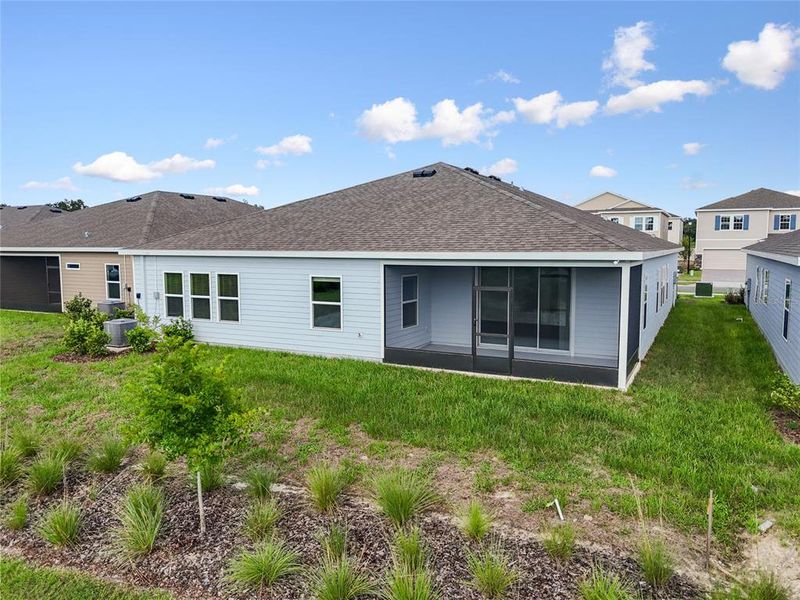Front exterior of a new home in , Newberry, FL, highlighting curb appeal (Image 20).