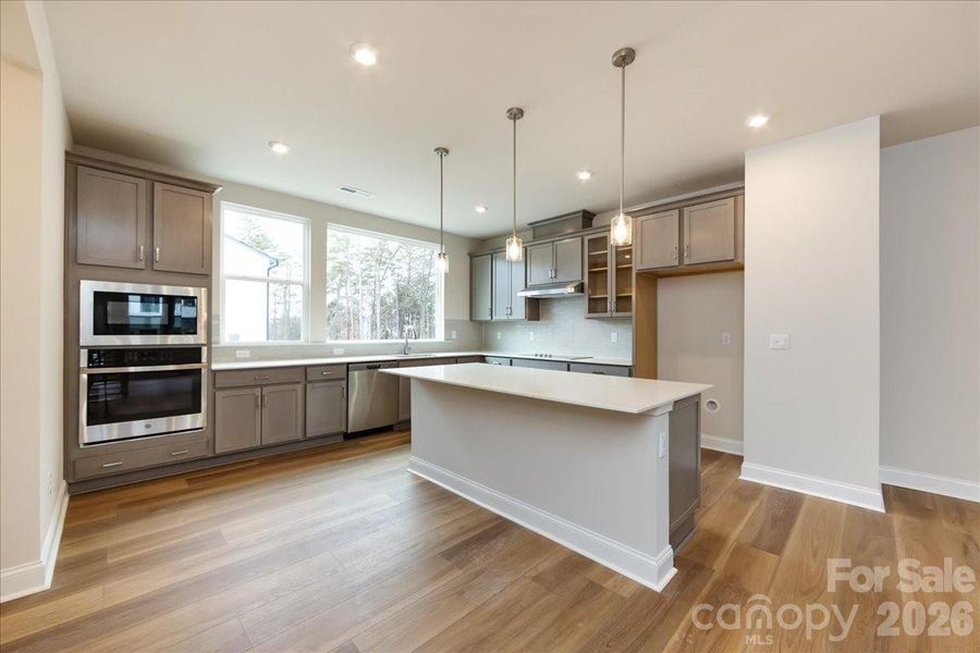 Gourmet Kitchen with White Quartz Countertops