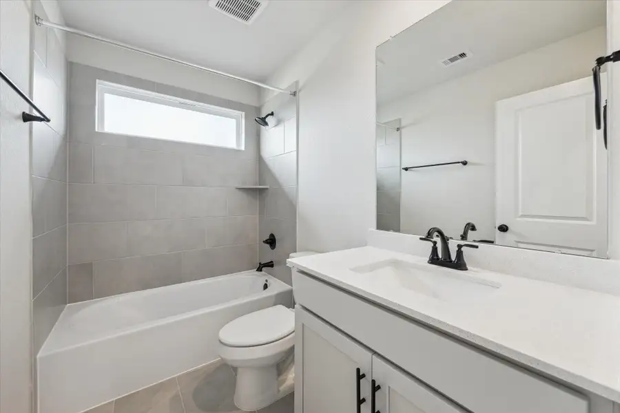 Furnished interior view inside a new home in Elyson, Katy (Image 8).