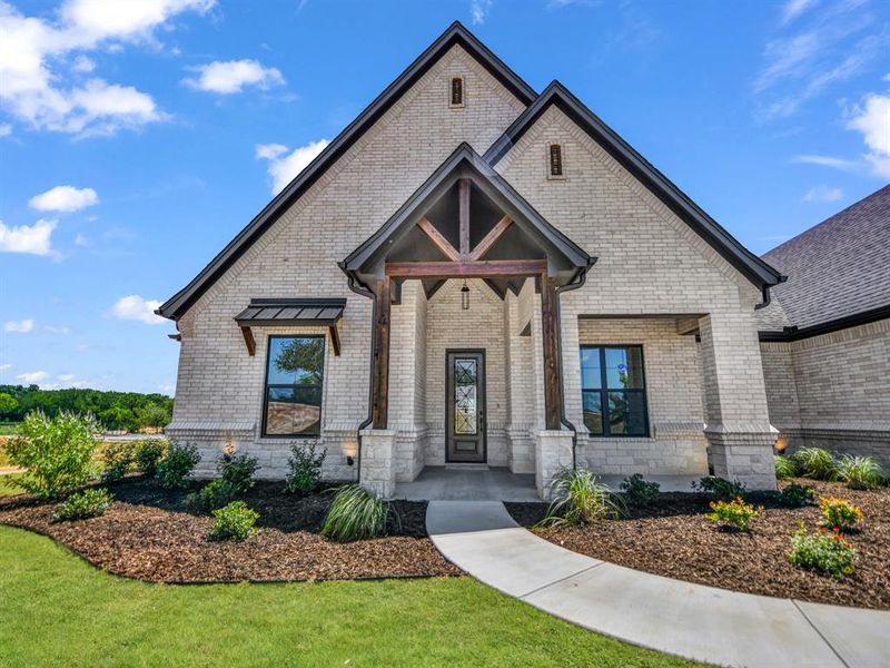 Front exterior of a new home in , Decatur, TX, highlighting curb appeal (Image 24).