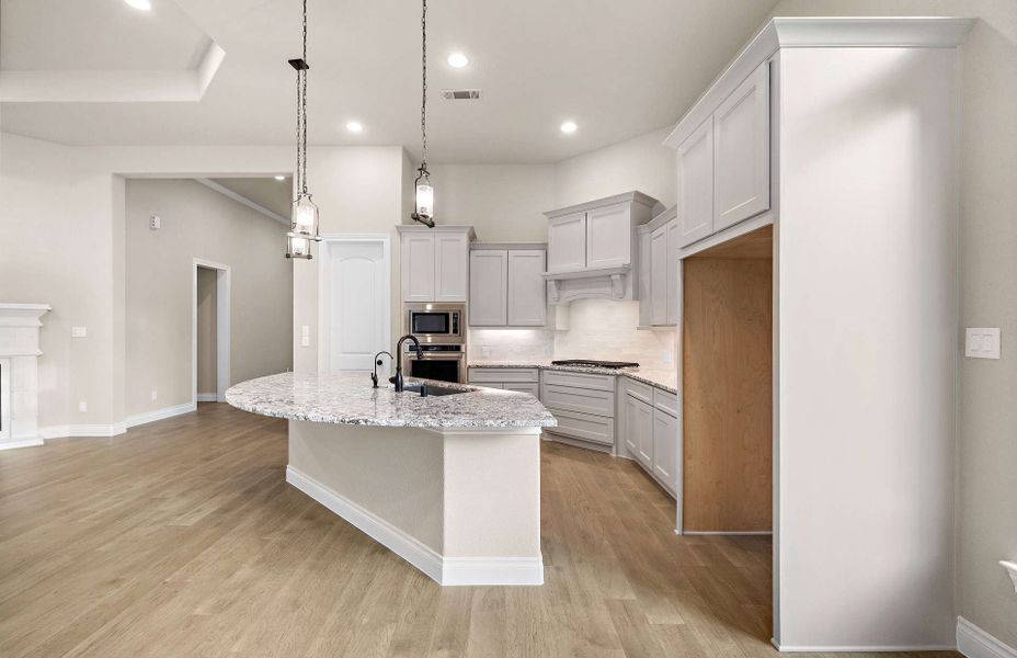 Representative furnished interior of a home built from the 2899 by Ravenna Homes in The Highlands 55′, Porter (Image 8). Representative furnished interior of a home built from the 2899 by Ravenna Homes in The Highlands 55′, Porter (Image 8).