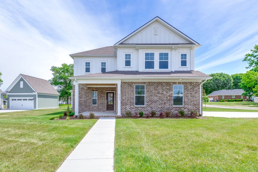 Front exterior of a new home in Rutherford, Columbia, TN, highlighting curb appeal (Image 2). Front exterior of a new home in Rutherford, Columbia, TN, highlighting curb appeal (Image 2).