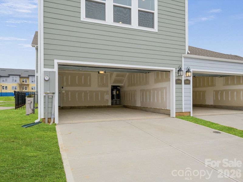 Exterior details and patio area of a home in North Creek Village, Huntersville (Image 18).