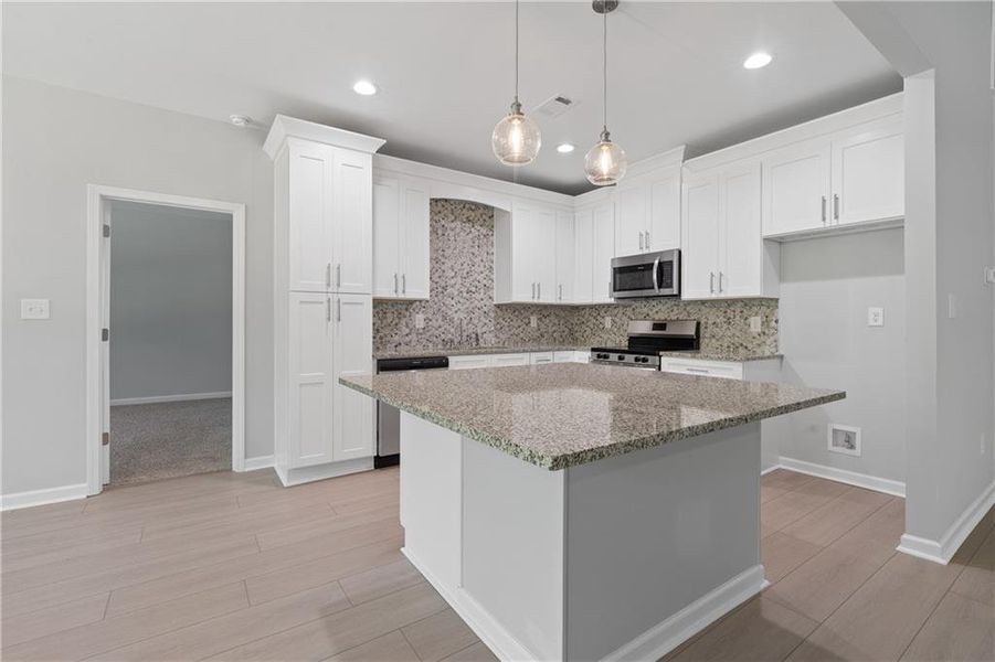 Furnished interior view inside a new home in , Gray (Image 7).