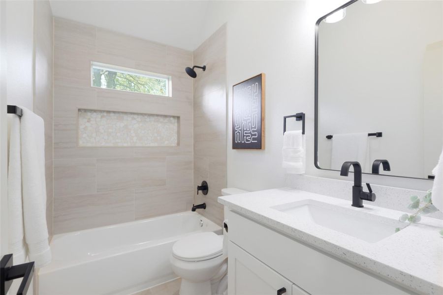 Full bathroom with vanity and bathing tub / shower combination