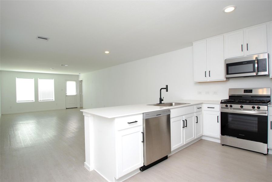 Furnished interior view inside a new home in Wharton Lakes, Wharton (Image 6).