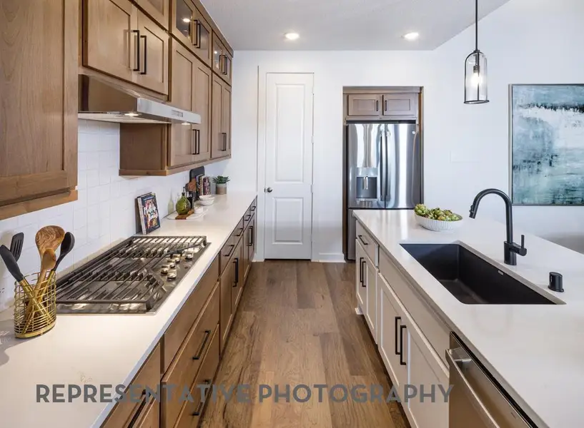 Furnished interior view inside a new home in ARTAVIA, Conroe (Image 4).