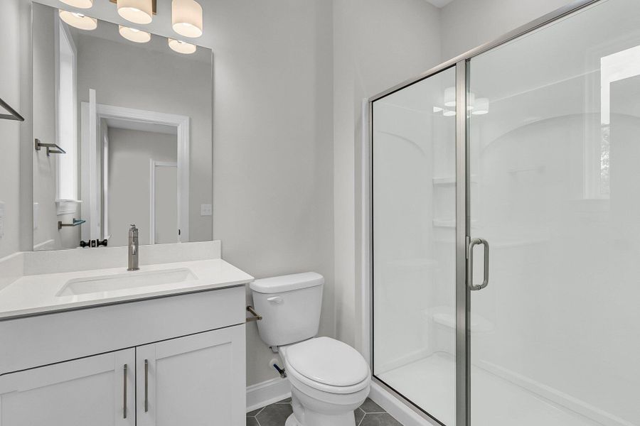Furnished interior view inside a new home in Tidewater at Lakes of Cane Bay, Summerville (Image 10).