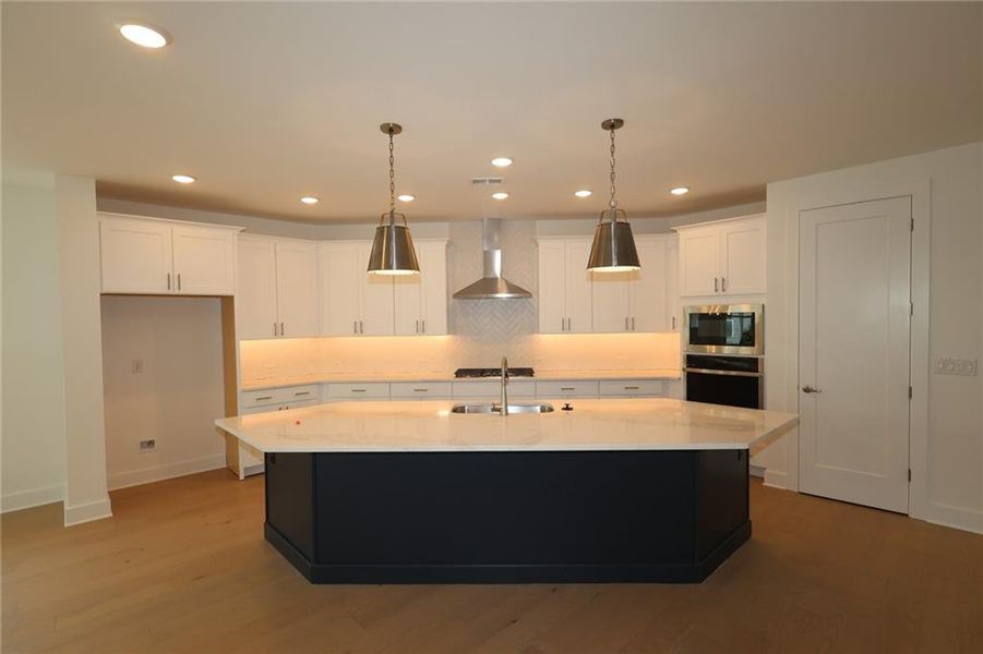 Furnished interior view inside a new home in Maple Grove at Towne Lake, Woodstock (Image 3).