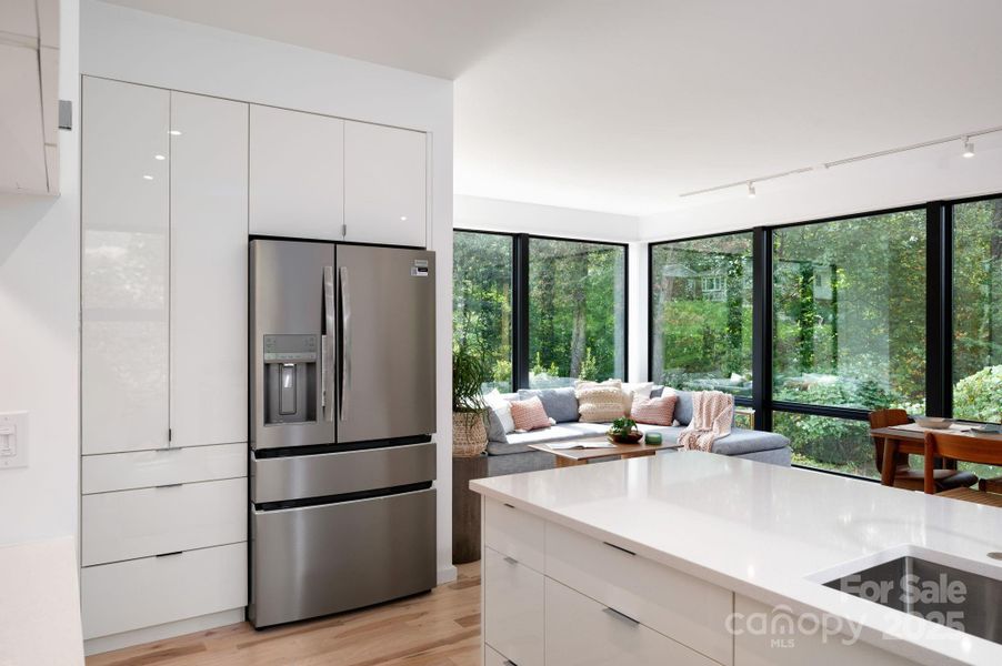 Enjoy Wooded Views Throughout Main Floor Enjoy Wooded Views Throughout Main Floor