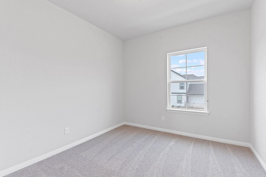 Spacious, unfurnished interior of a new home in Retreat at Hero Way, Leander (Image 15).