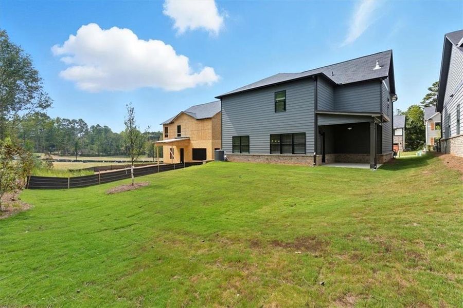 Exterior details and patio area of a home in Meadow Pines, Dallas (Image 2).