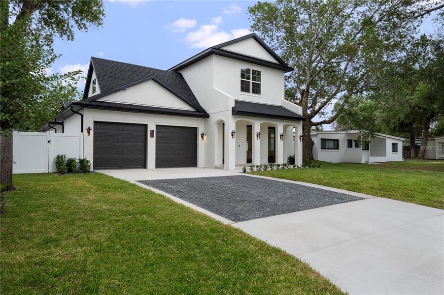 Front exterior of a new home in , Winter Park, FL, highlighting curb appeal (Image 24).